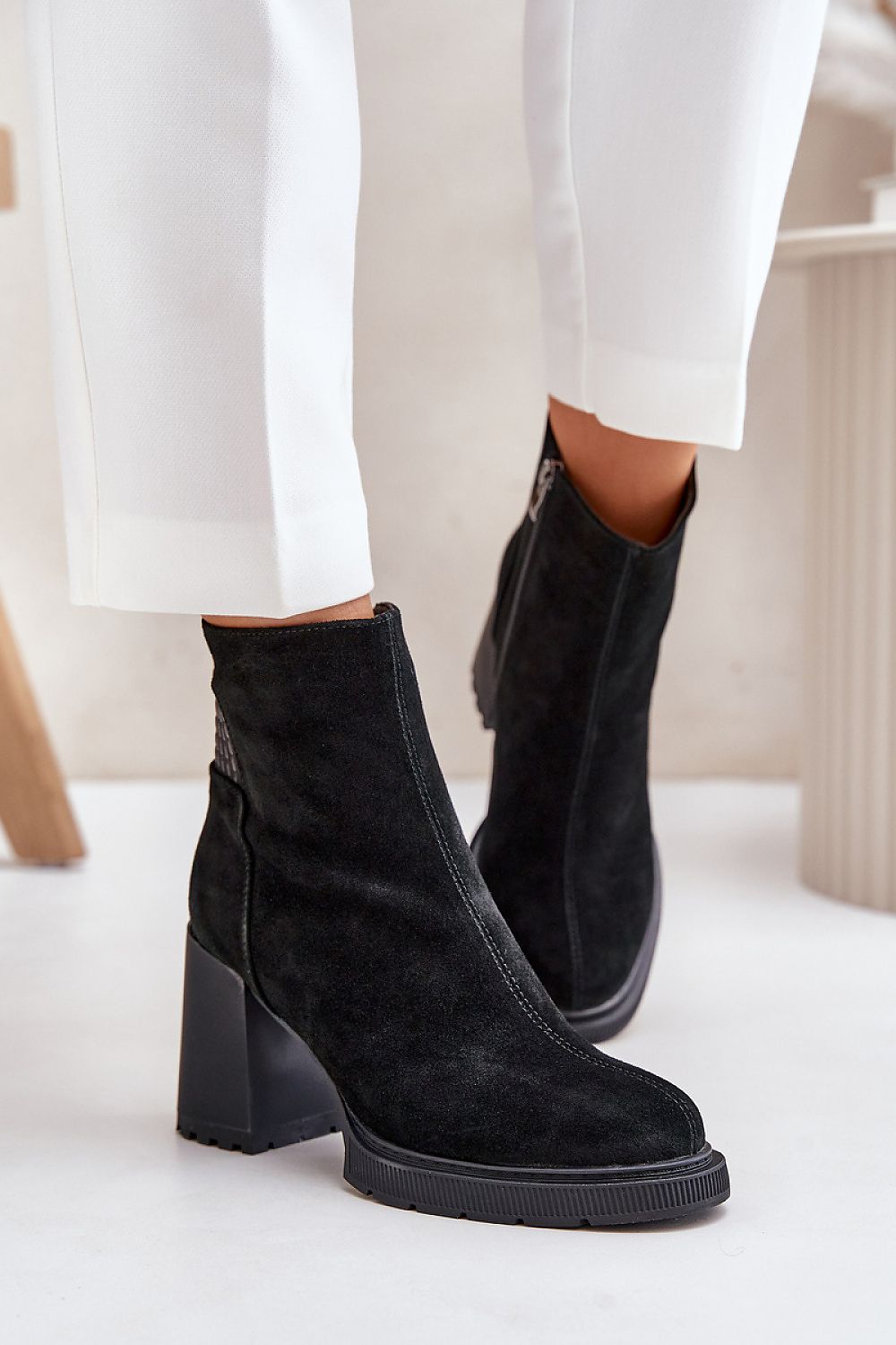 Heel boots Step in style